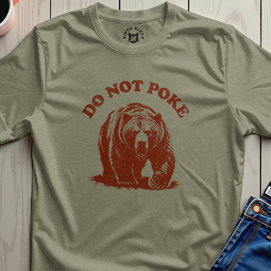 Olive t-shirt with distressed red text "DO NOT POKE" above a grizzly bear graphic.