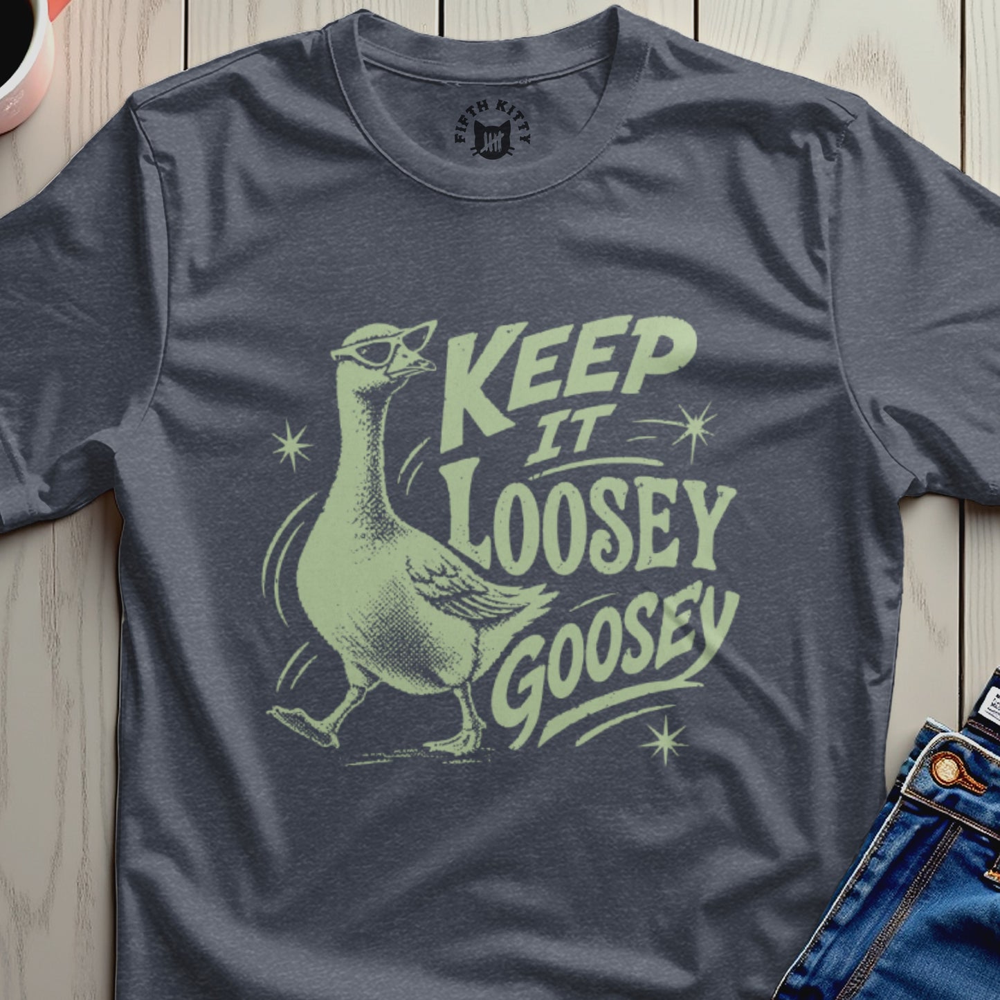 Dark grey t-shirt with a goose wearing sunglasses and the text "Keep It Loosey Goosey".