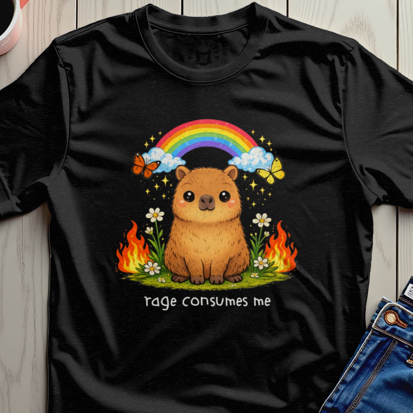 Capybara with rainbow, butterflies, and flames, text "rage consumes me".