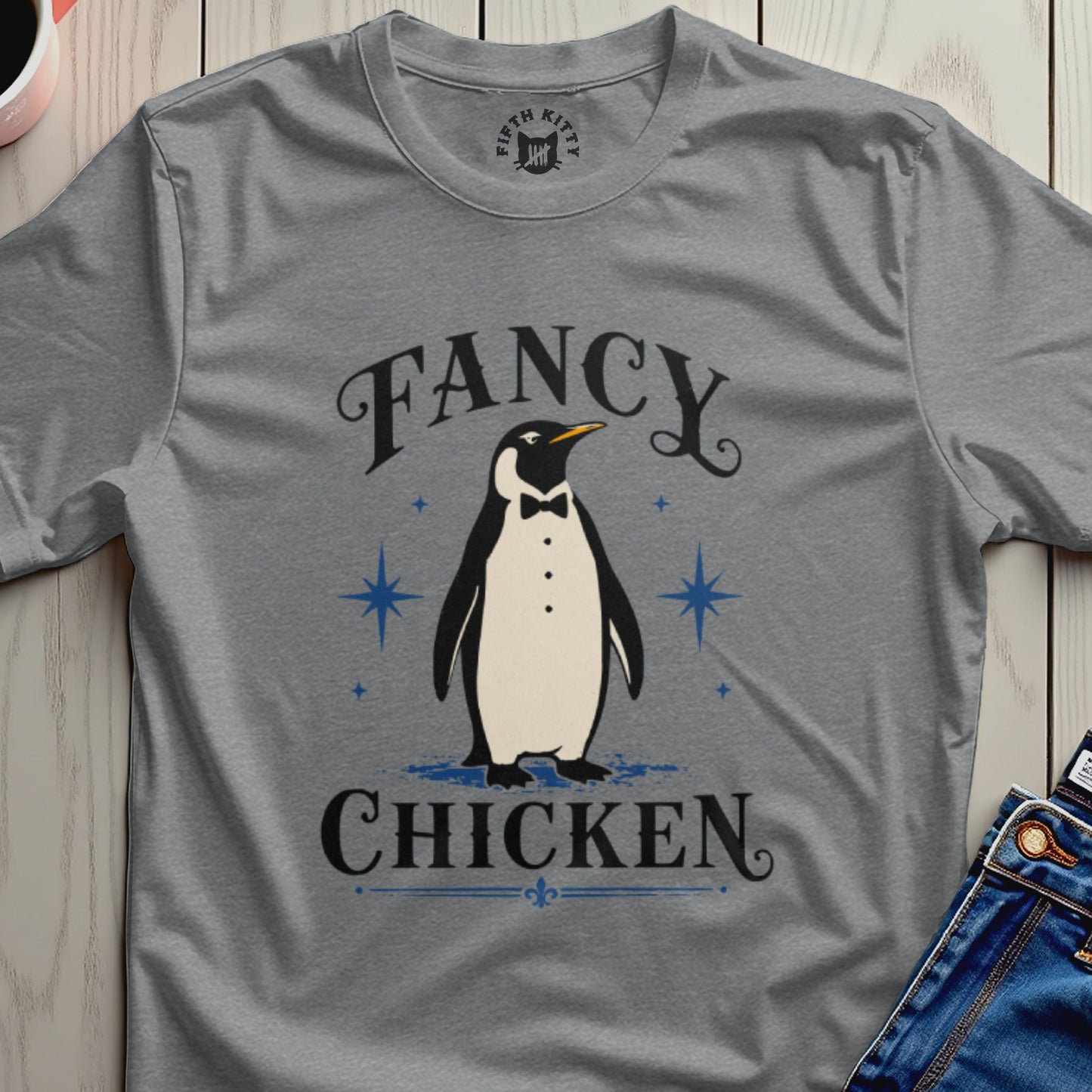 Grey t-shirt with a penguin wearing a tuxedo and the text "Fancy Chicken".