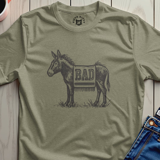 Donkey wearing a blanket with "BAD" printed on it.