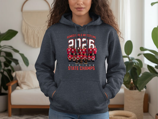 Dark gray hoodie with "Romeo Girls Wrestling 2026 Michigan State Champs" and team photo.