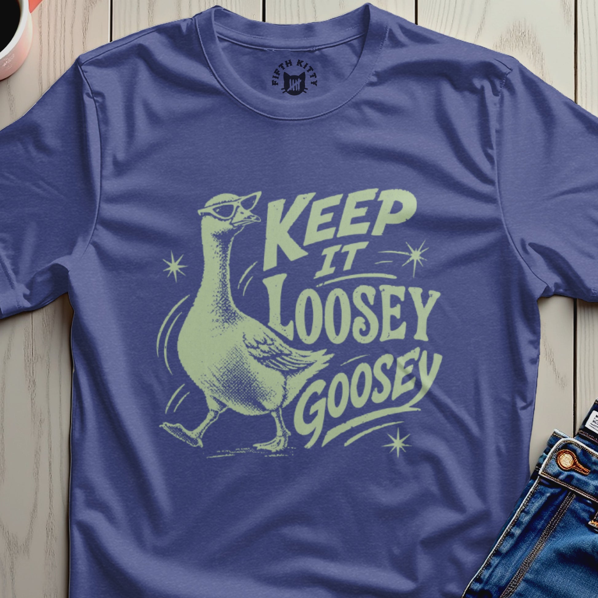 T-shirt with a goose wearing sunglasses and text that reads "KEEP IT LOOSEY GOOSEY".