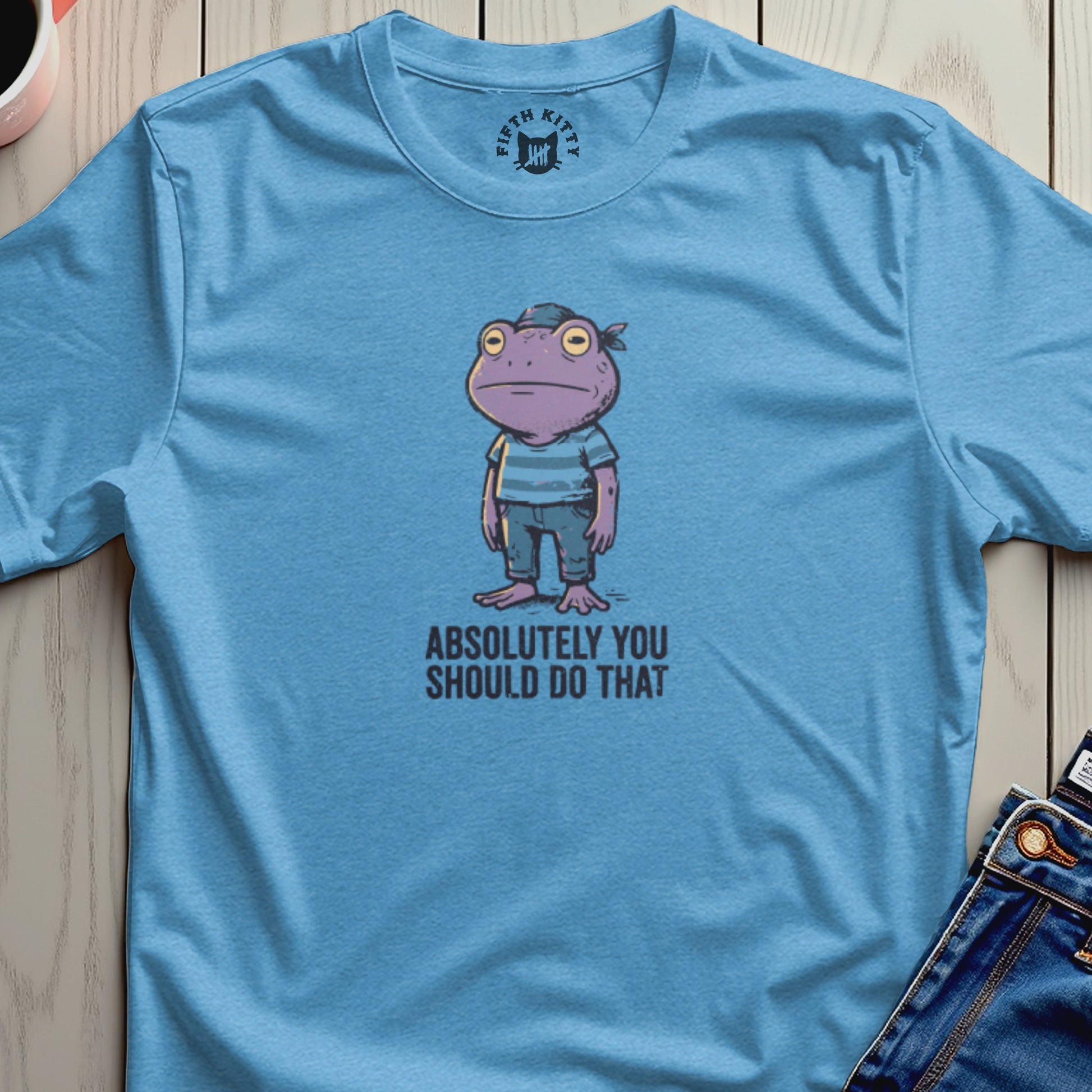 Light blue t-shirt with cartoon purple frog wearing bandana and striped shirt, text "ABSOLUTELY YOU SHOULD DO THAT".