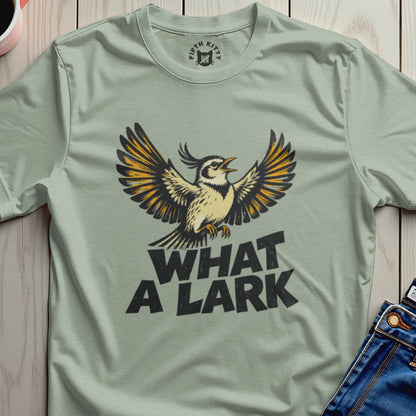 Bird with wings spread open, text "WHAT A LARK" below.