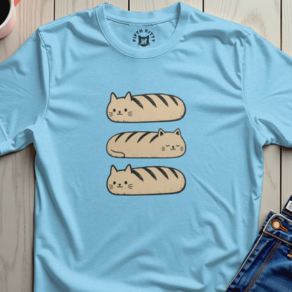 Light blue t-shirt with three brown bread-shaped cats stacked vertically.