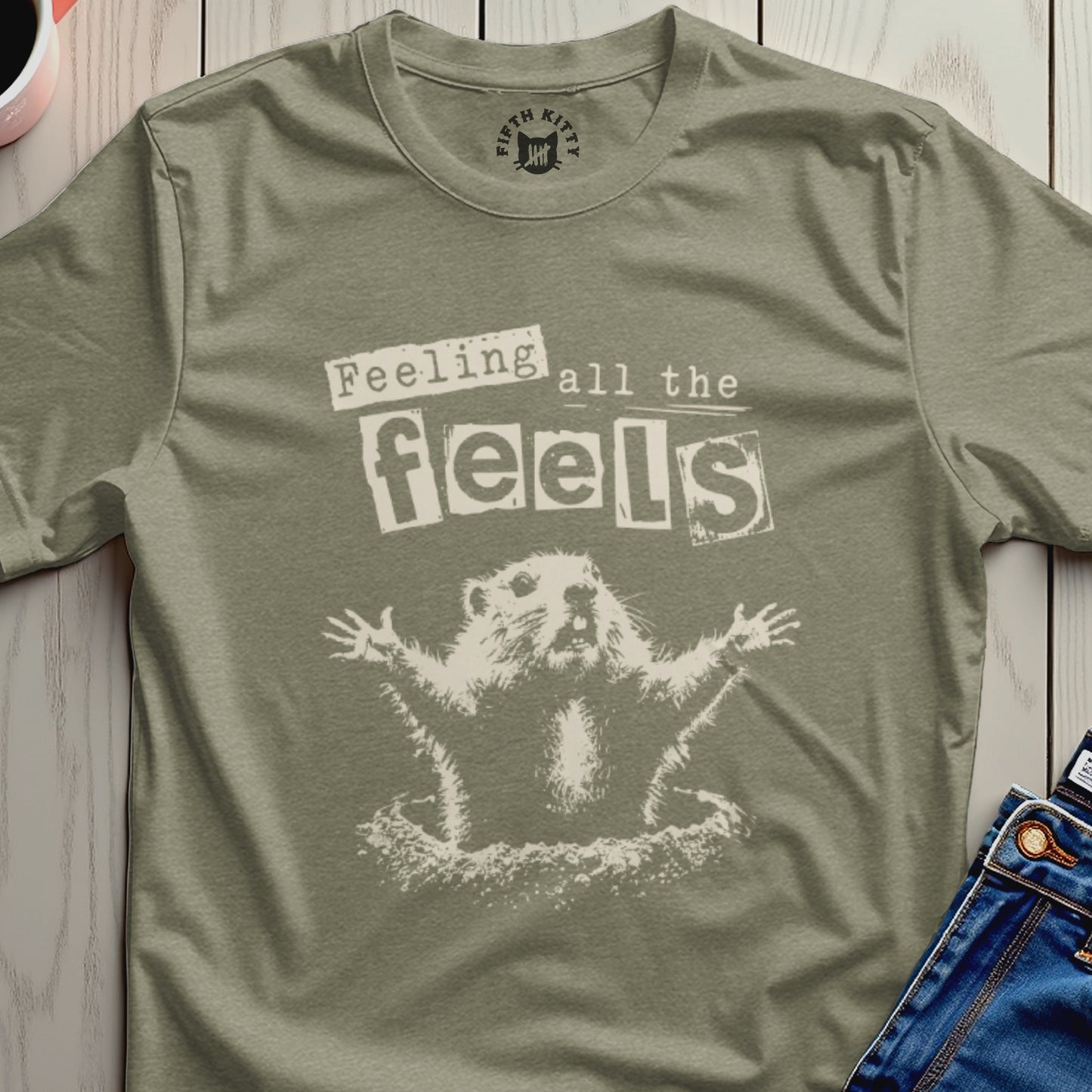 Groundhog with arms outstretched, text "Feeling all the feels".