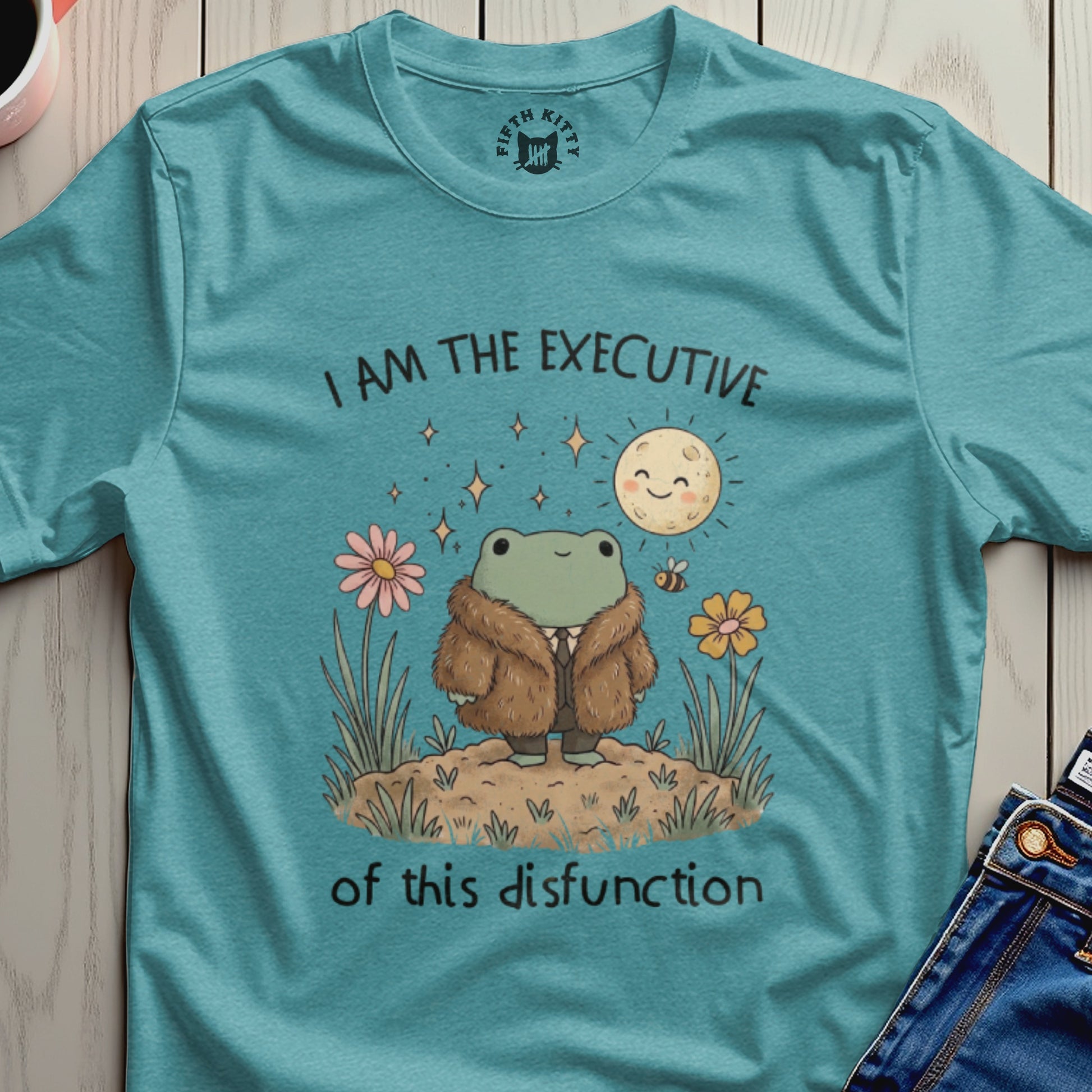 T-shirt with a frog in a fur coat, moon, and flowers.