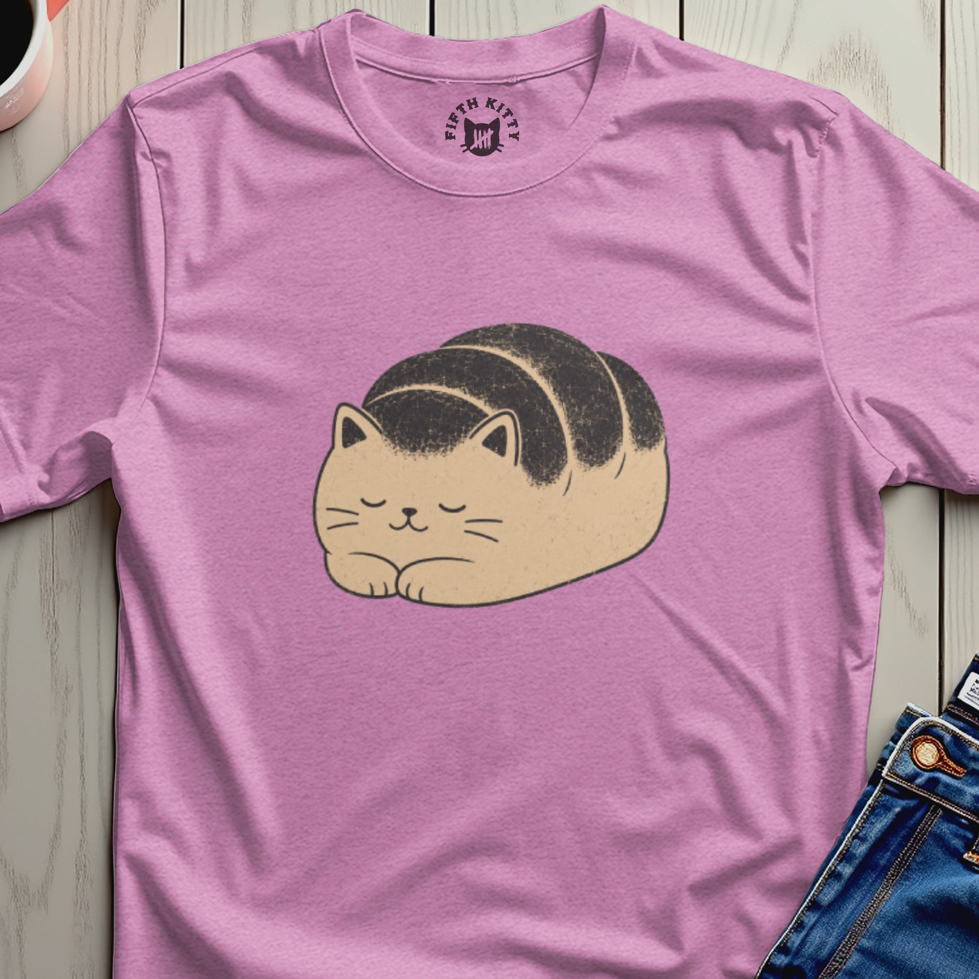 Pink t-shirt with a cute illustrated loaf-shaped cat and "FIFTH KITTY" logo.