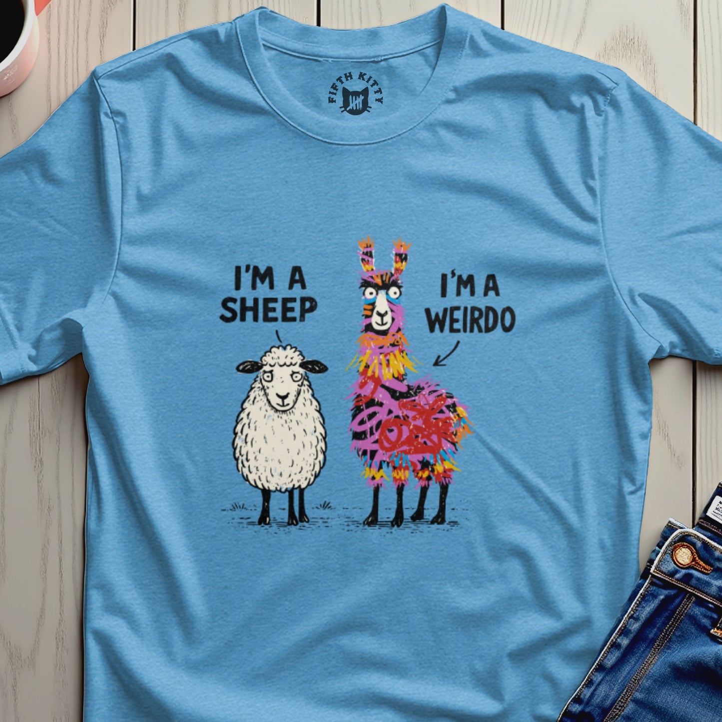 T-shirt with cartoon sheep and colorful llama, text reads "I'M A SHEEP I'M A WEIRDO".