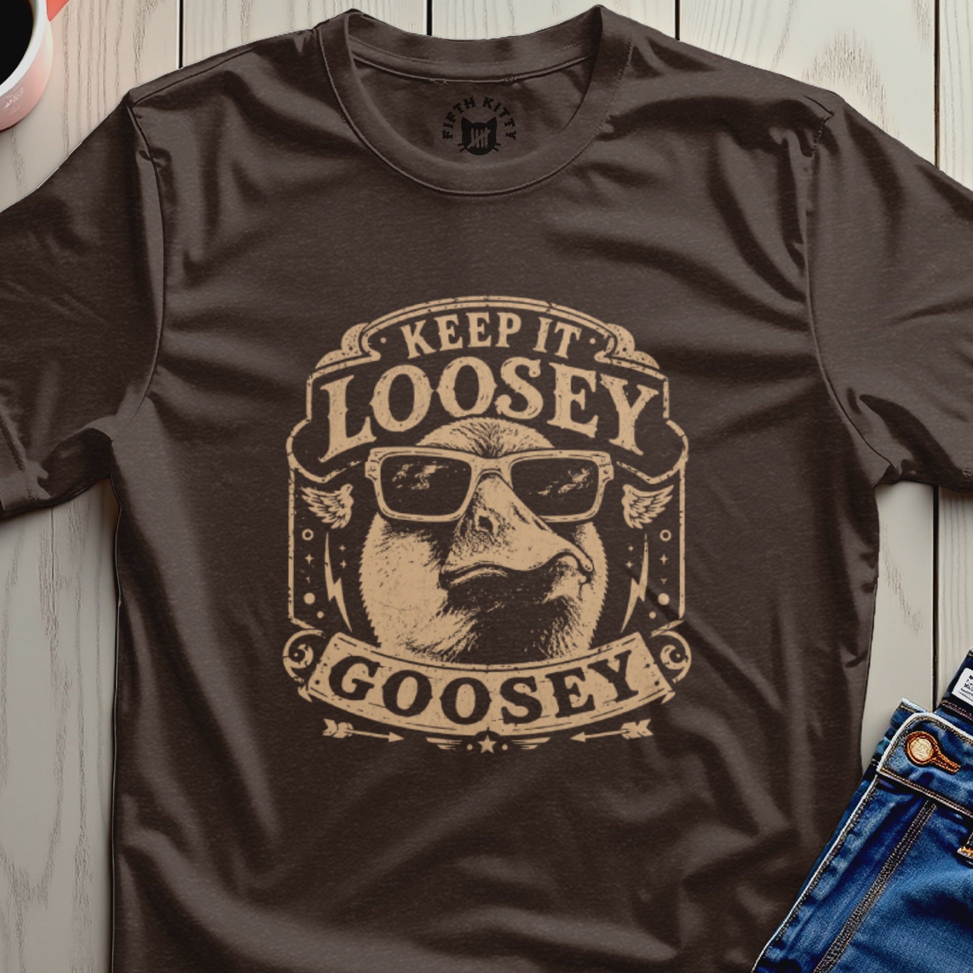 T-shirt with a cartoon goose wearing sunglasses and the text "KEEP IT LOOSEY GOOSEY".