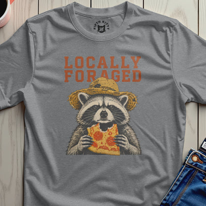 Raccoon wearing a straw hat eating a slice of pizza, "Locally Foraged" text.