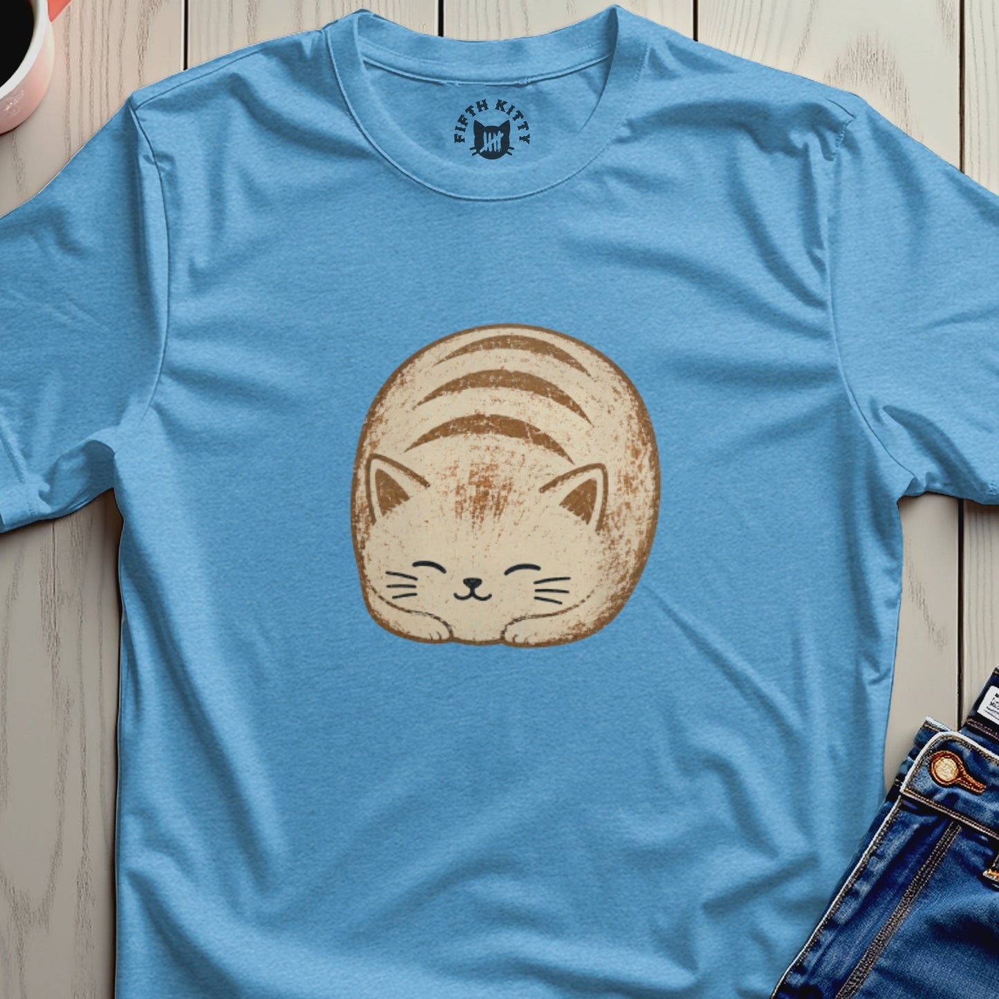 Light blue t-shirt with a sleeping tabby cat graphic and "FIFTH KITTY" logo.
