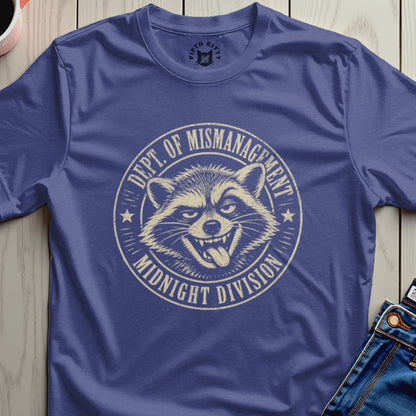 Raccoon wearing distressed "Dept. of Mismanagement Midnight Division" circular graphic on a navy t-shirt.