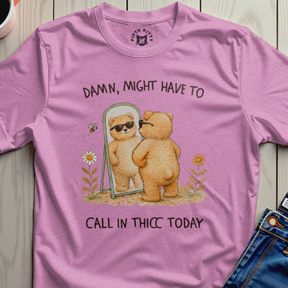 Bear wearing sunglasses looks in mirror, text reads "Damn, might have to call in thicc today."