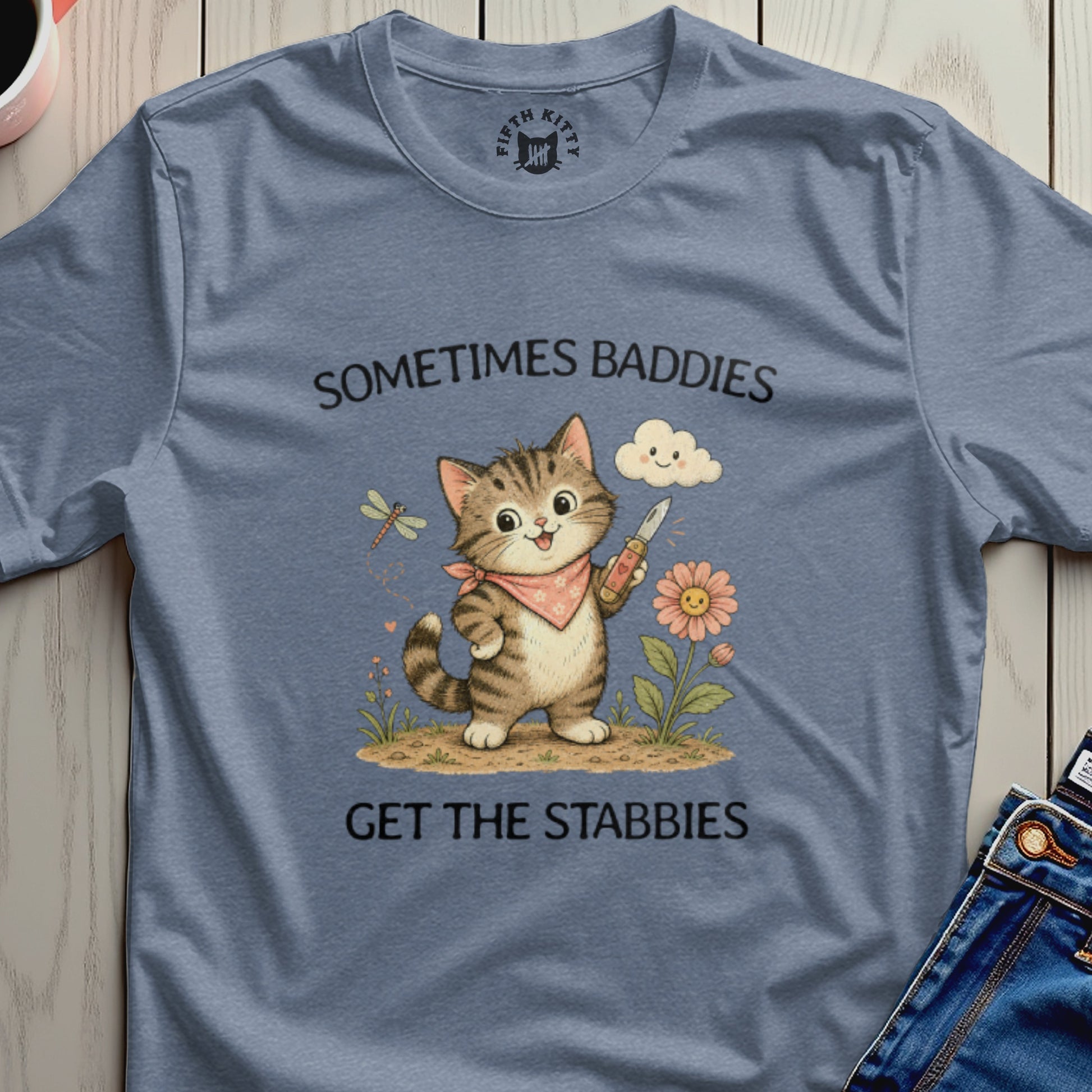 Cute cat with a knife and bandana on a t-shirt.