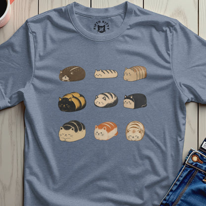 T-shirt with a print of nine different loaf-shaped cats in three rows.