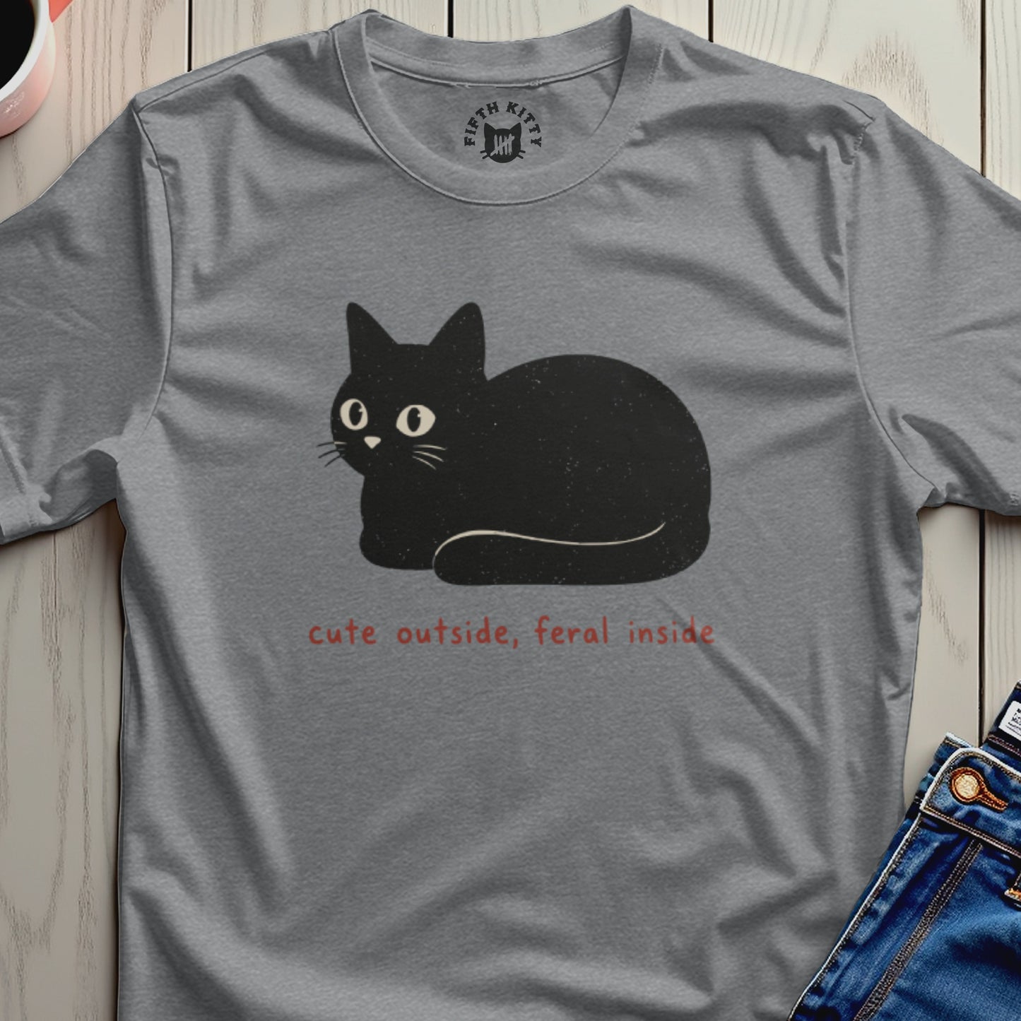 Gray t-shirt with a black cat graphic and the text "cute outside, feral inside."