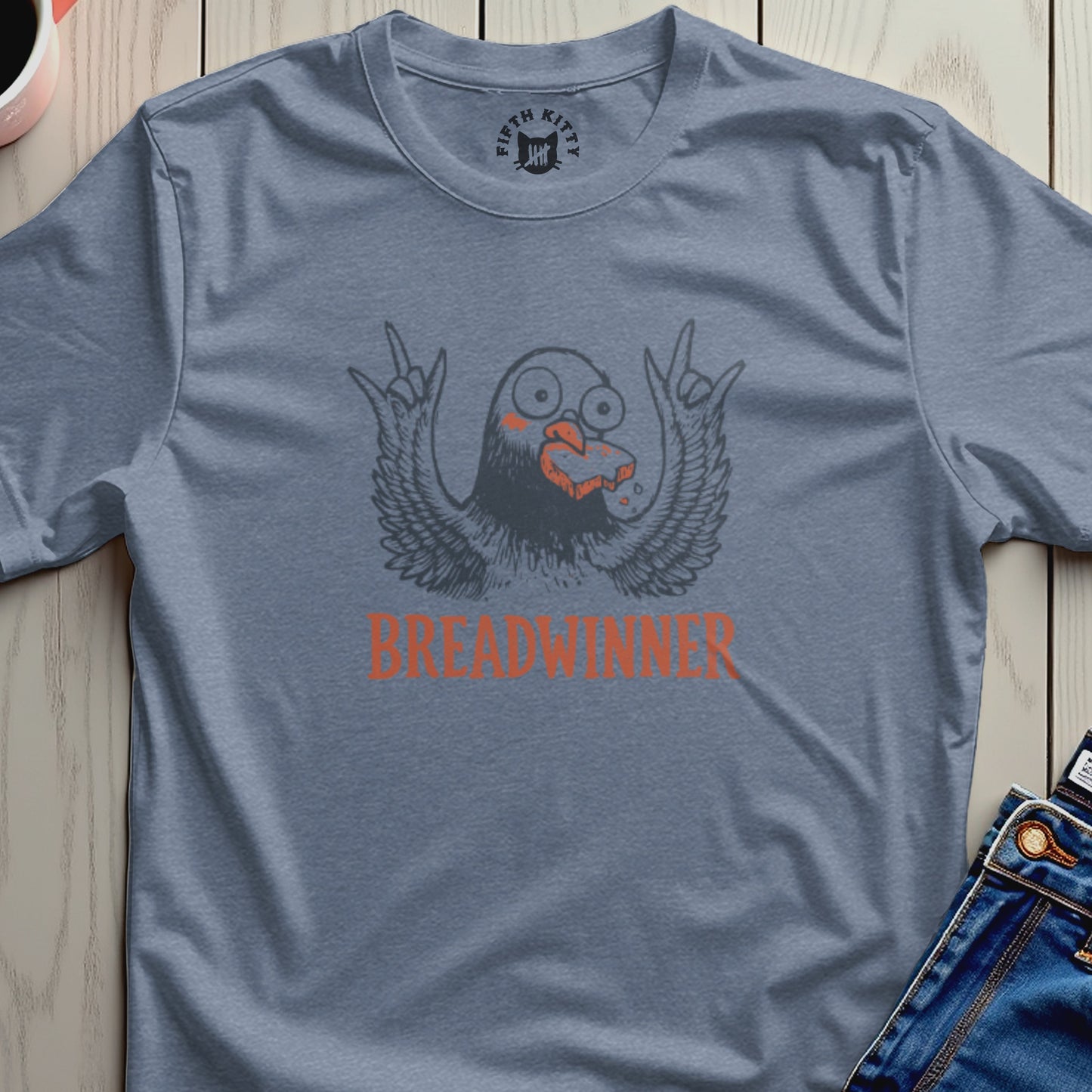 Bird character with wings spread, holding bread, with "BREADWINNER" text.