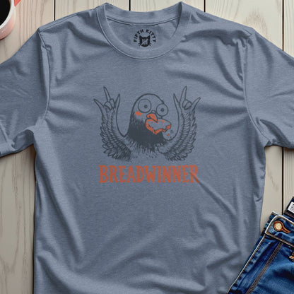 Bird character with wings spread, holding bread, with "BREADWINNER" text.
