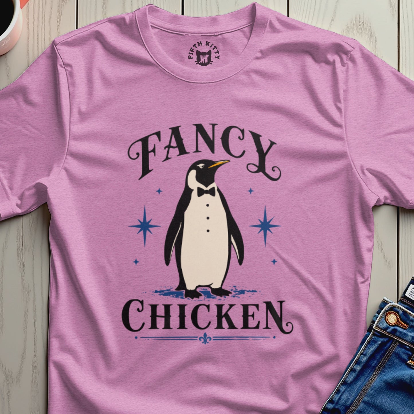 Pink t-shirt with "FANCY CHICKEN" text and a tuxedo-wearing penguin graphic.