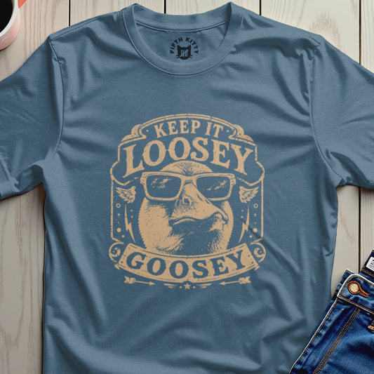 Blue t-shirt with a circular graphic featuring a duck wearing sunglasses and the text "KEEP IT LOOSEY GOOSEY".