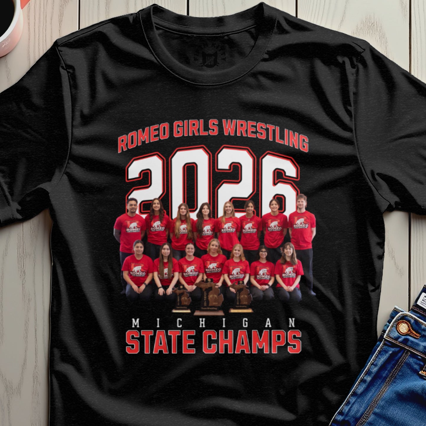 Romeo Girls Wrestling 2026 Michigan State Champs team photo on black t-shirt.