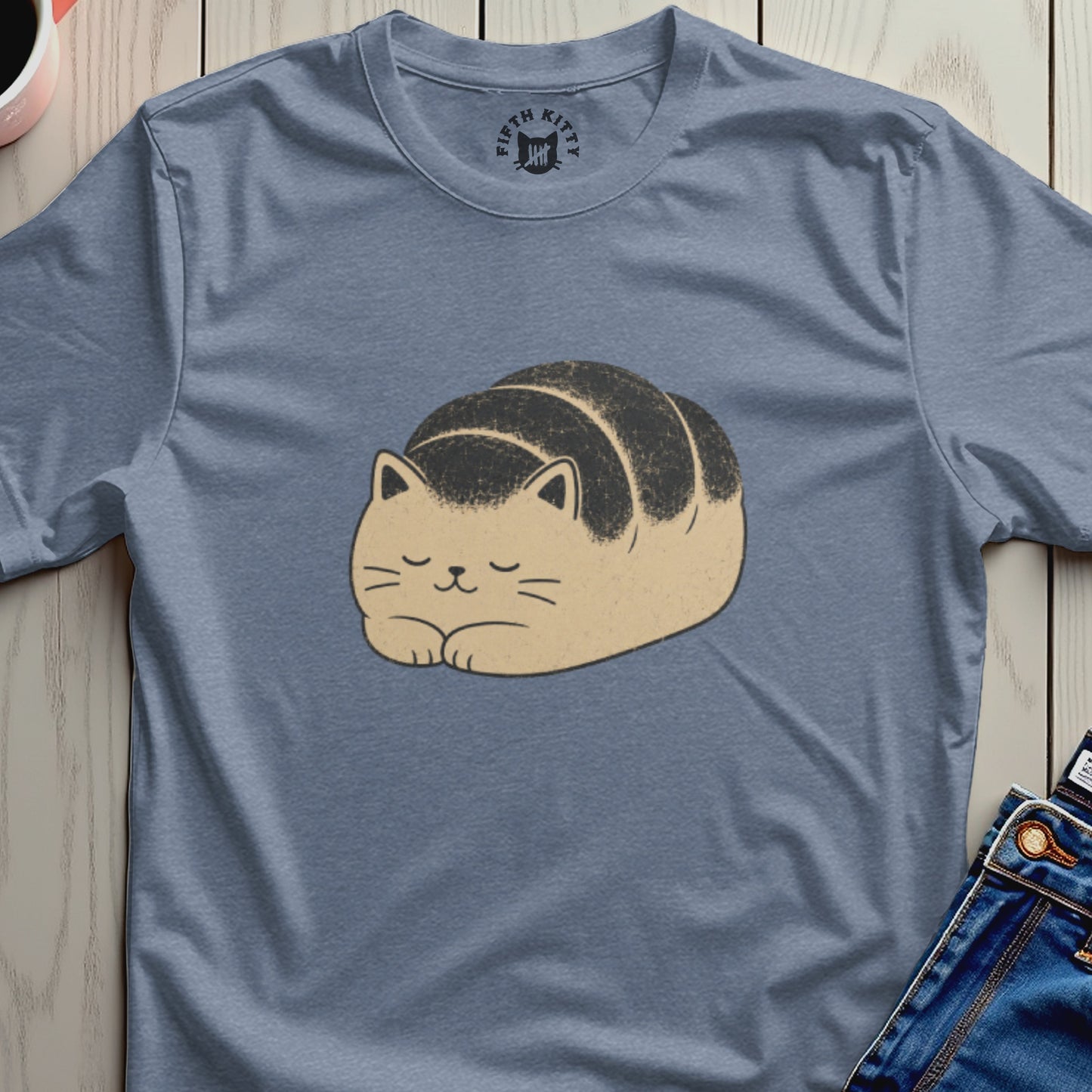 Blue t-shirt with a cartoon loaf-shaped cat design and "Fifth Kitty" logo.
