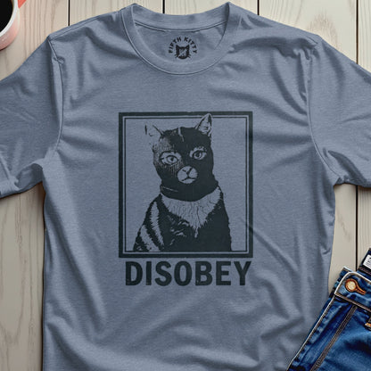 Grey t-shirt with a black and white graphic of a cat wearing a ski mask with the word "DISOBEY".