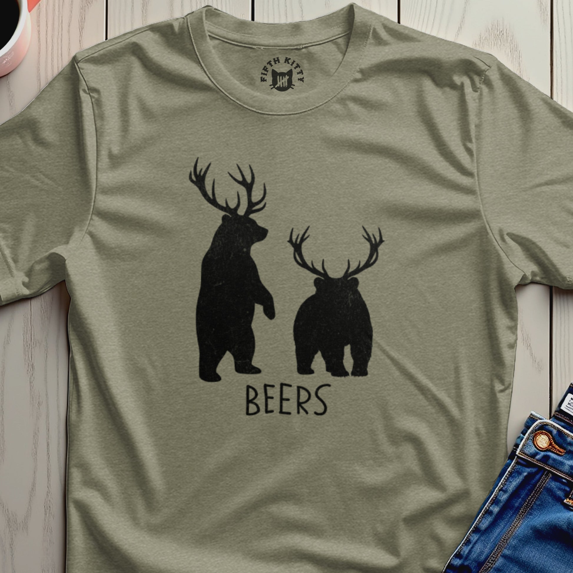 Two silhouette bears with antlers and "BEERS" text on a tan t-shirt.