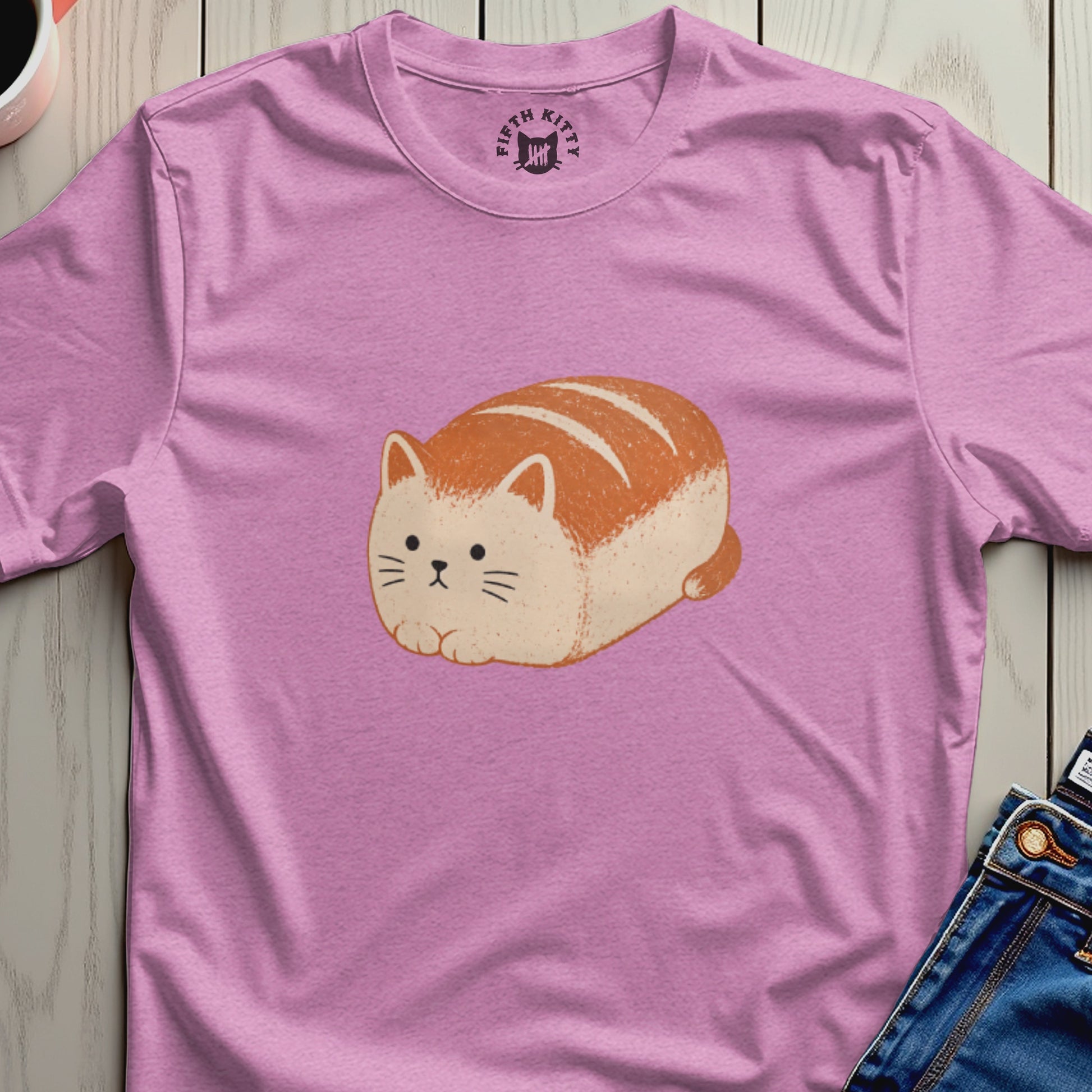 Pink t-shirt with illustration of a cat loaf and "Fifth Kitty" logo.