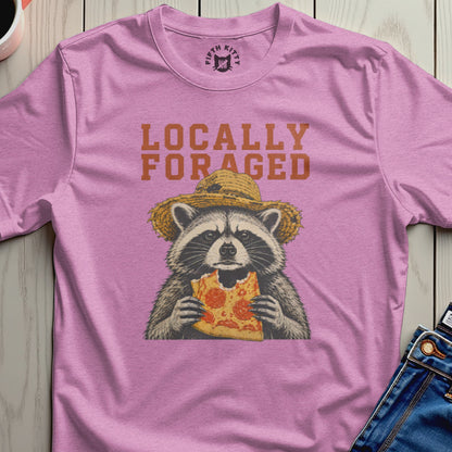Raccoon wearing straw hat eating pizza, text "LOCALLY FORAGED".