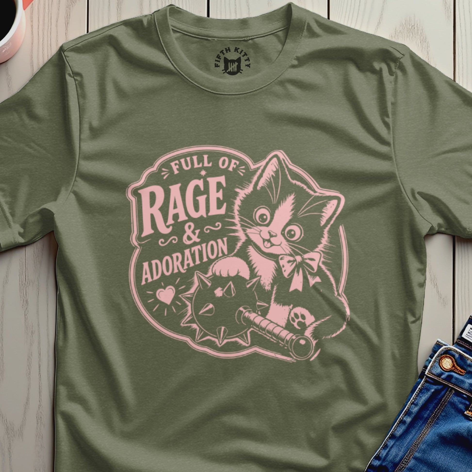 Olive t-shirt with pink cat, mace, and "Full of Rage & Adoration" text.