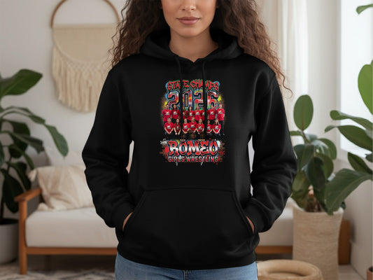 Black hoodie with "State Champs 2026 Romeo Girls Wrestling" text and team photo.