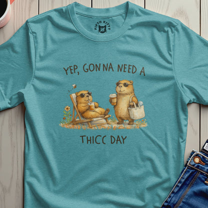 Two bears in sunglasses relax with drinks, with text "YEP, GON NA NEED A THICC DAY".