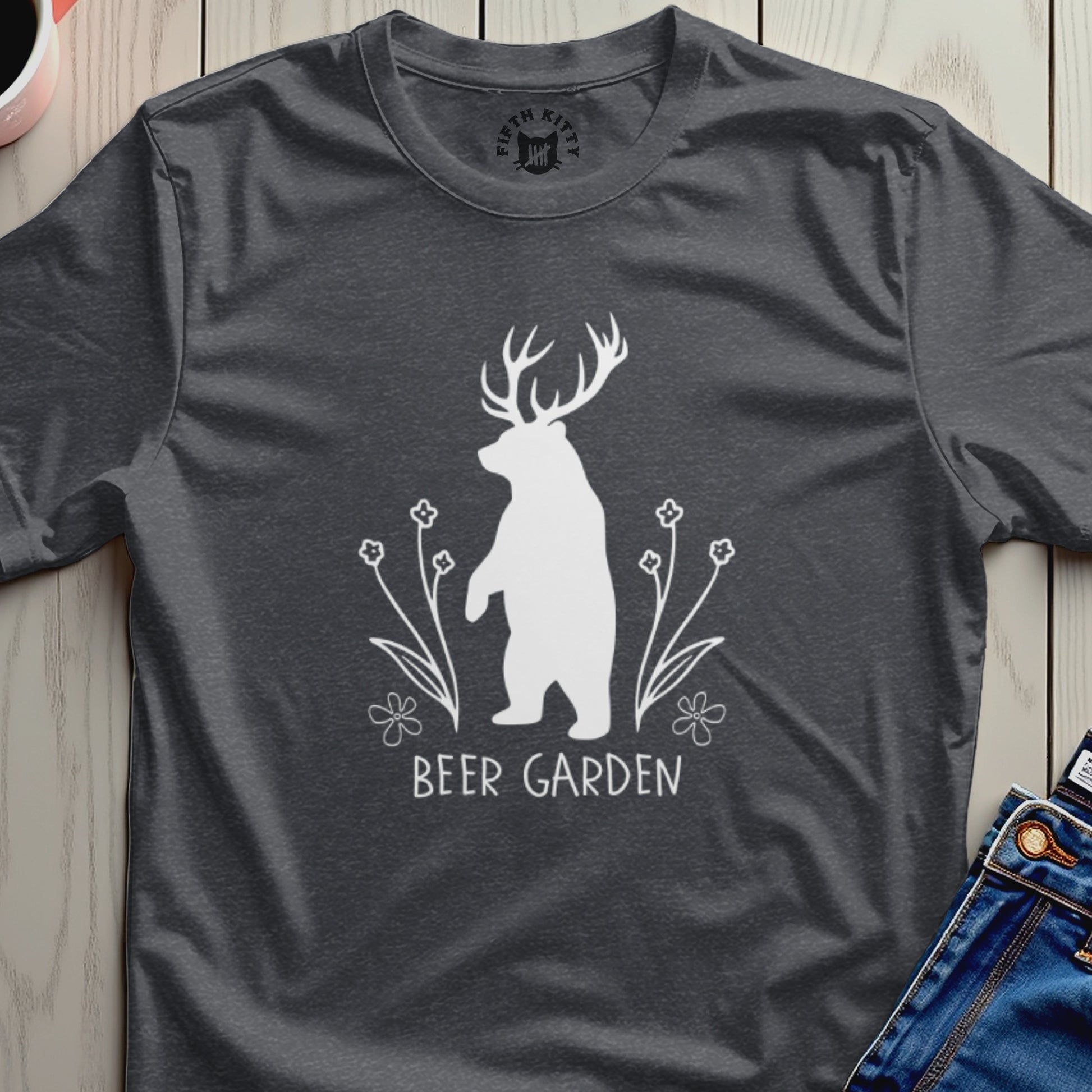 White bear with antlers and flowers, text "BEER GARDEN" on dark shirt.