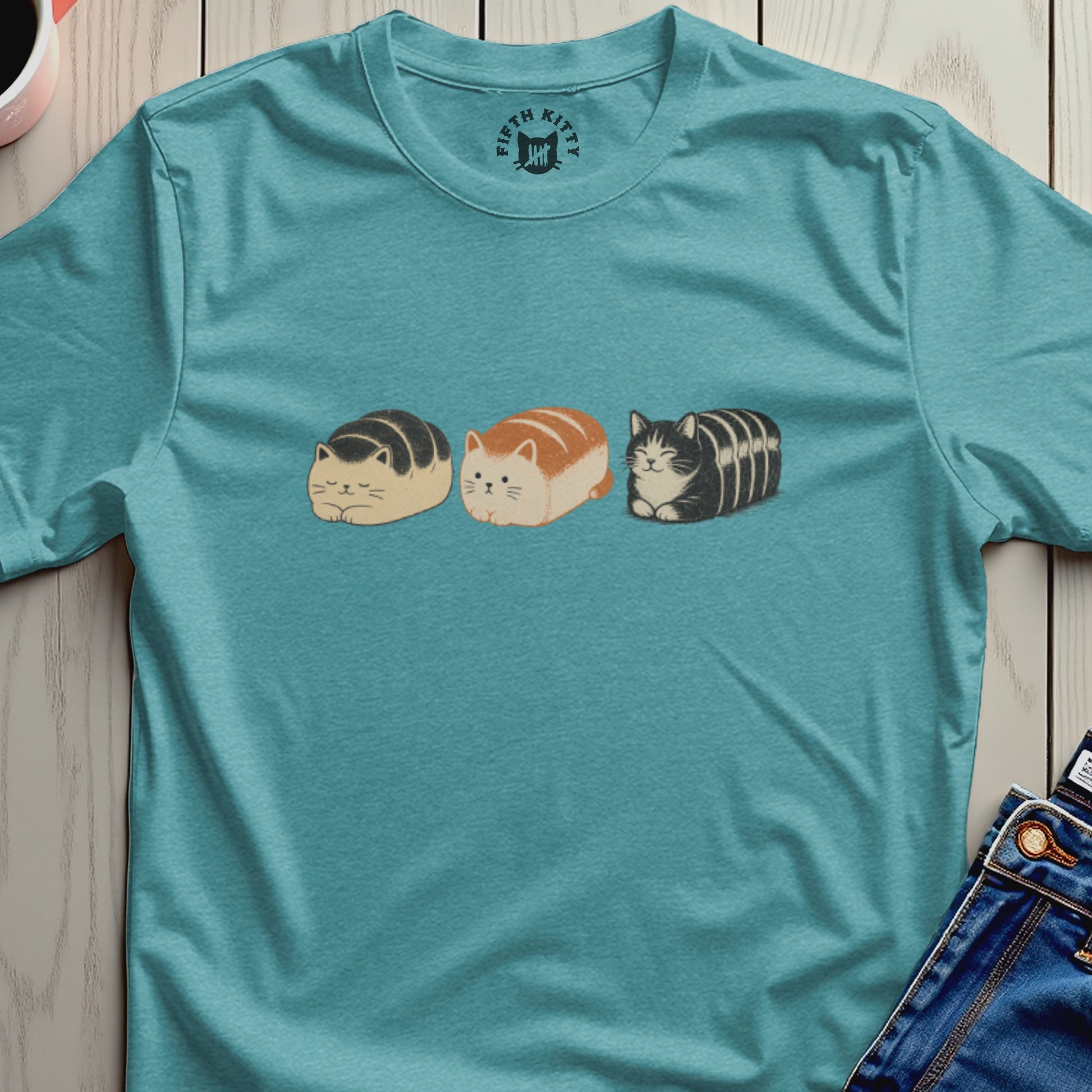T-shirt with three loaf-shaped cats wearing "FIFTH KITTY" logo and jeans.