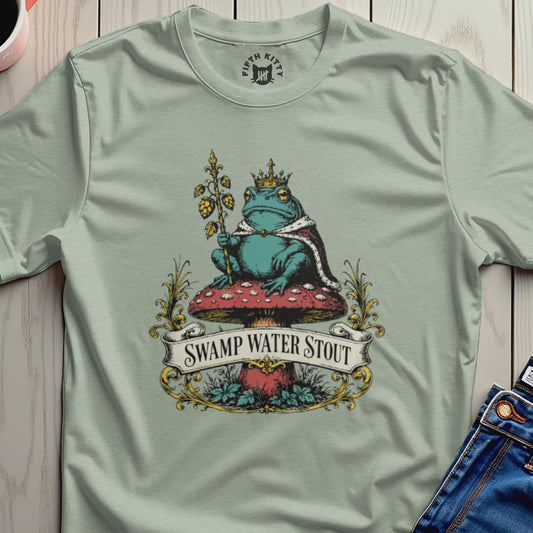Frog wearing a crown sits on a mushroom with "Swamp Water Stout" banner.