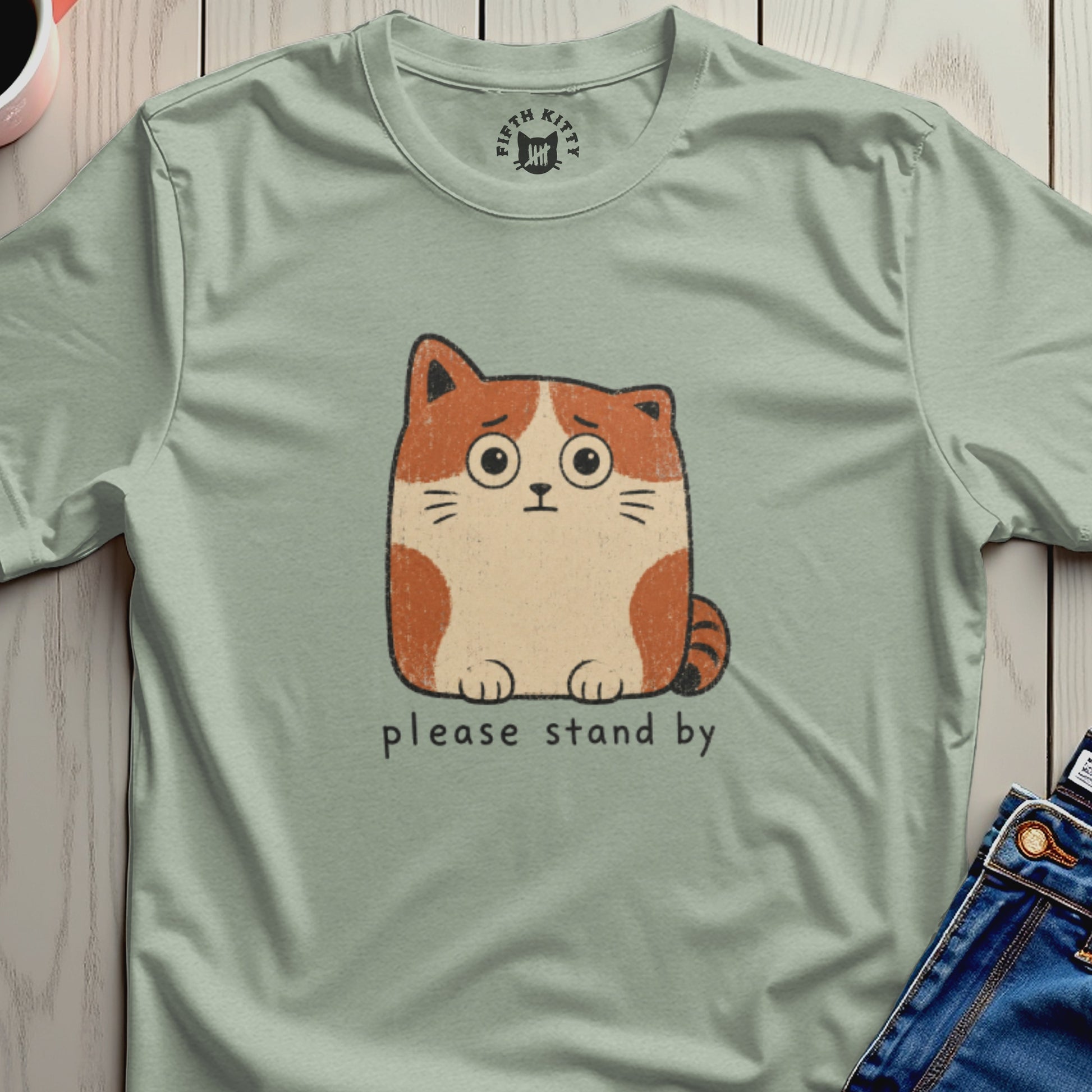 Light green t-shirt with a cartoon