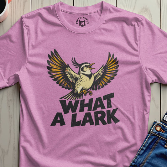 Pink t-shirt with "WHAT A LARK" and a stylized bird graphic.