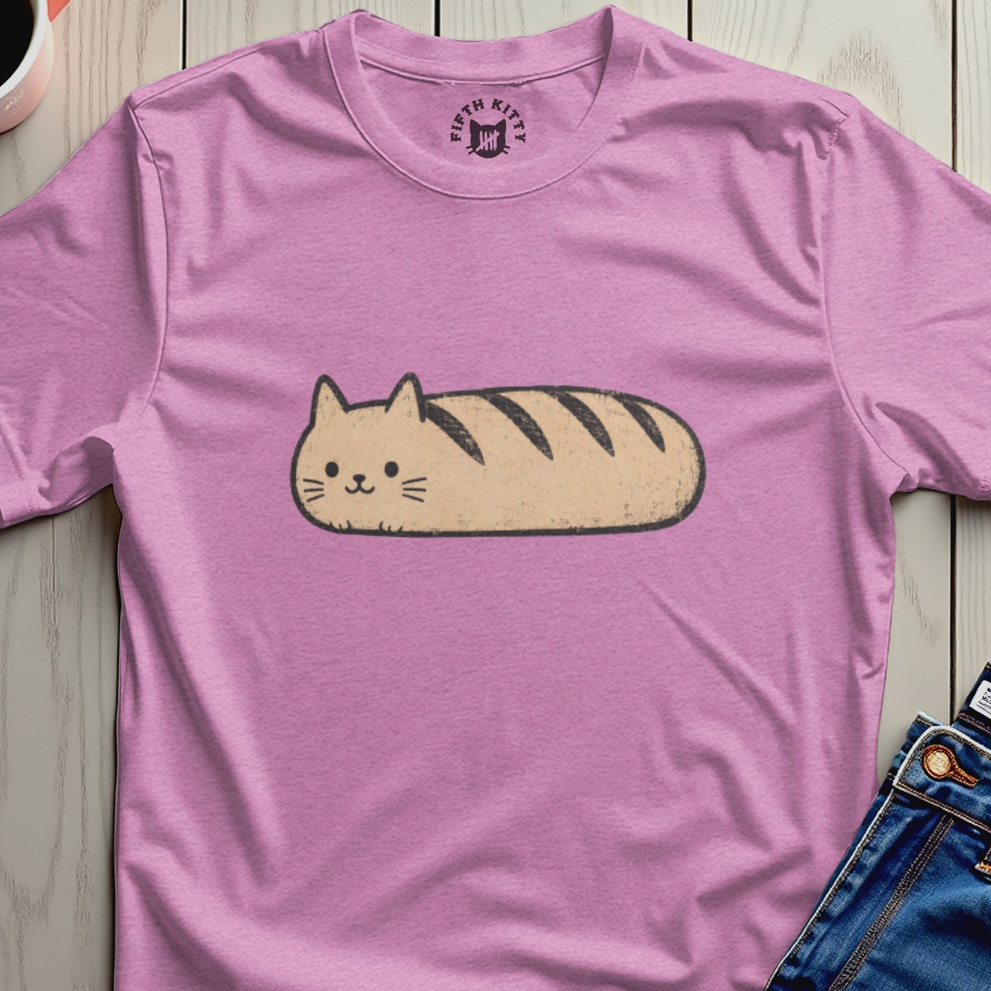 Pink t-shirt with a loaf-shaped cat graphic and "FIFTH KITTY" logo.