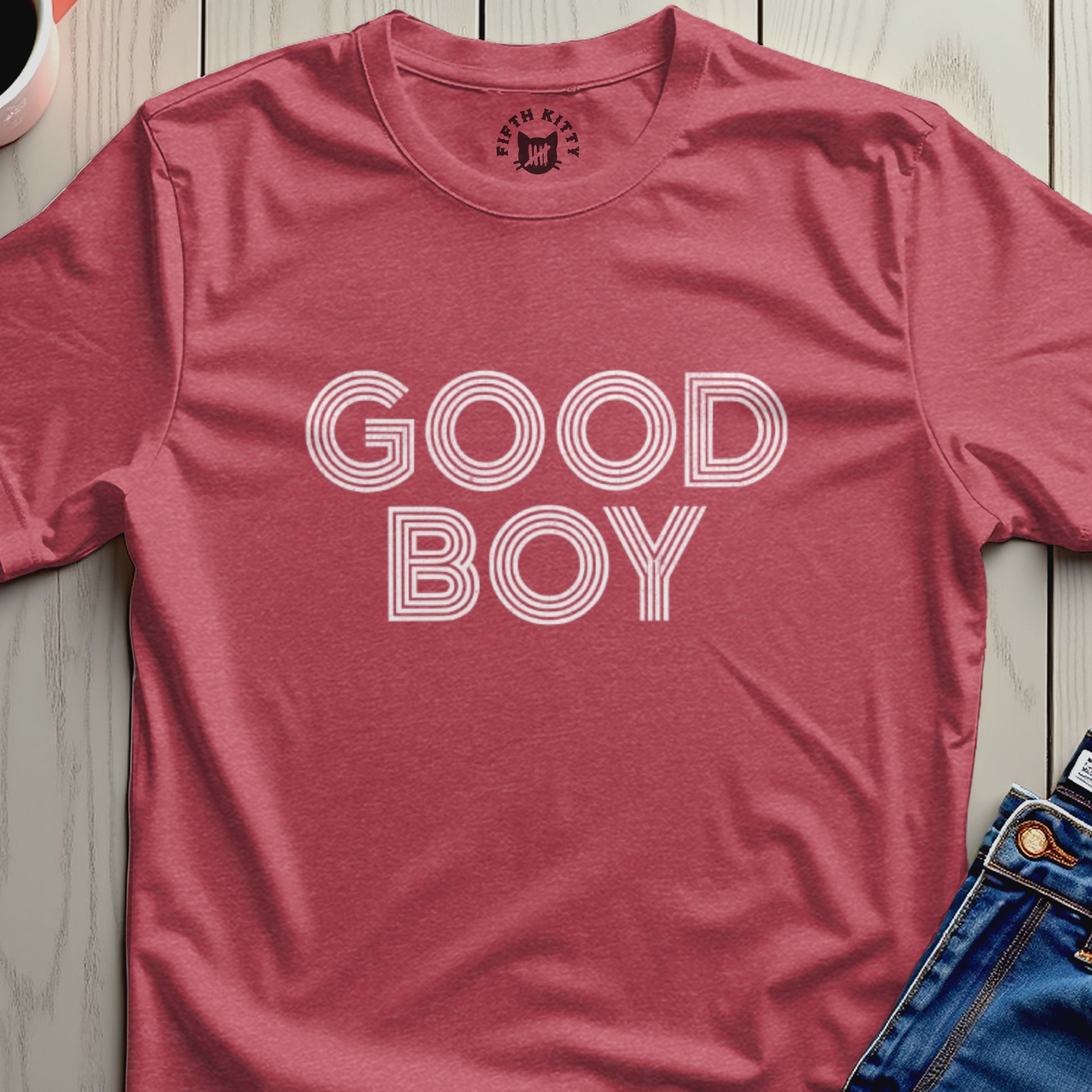 Red t-shirt with "GOOD BOY" in white outline text.