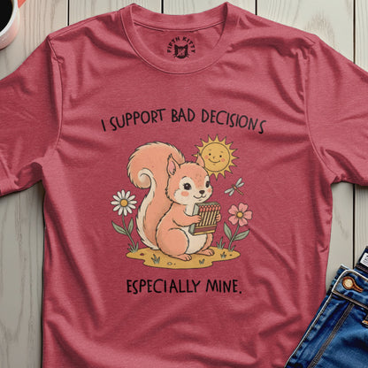 Red t-shirt with a squirrel holding matchsticks and the text "I SUPPORT BAD DECISIONS ESPECIALLY MINE."