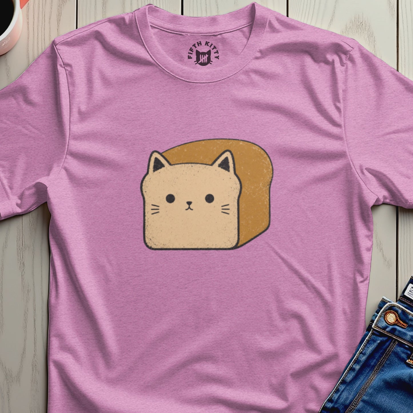 Pink t-shirt with a cartoon cat-shaped bread print and "FIFTH KITTY" logo.