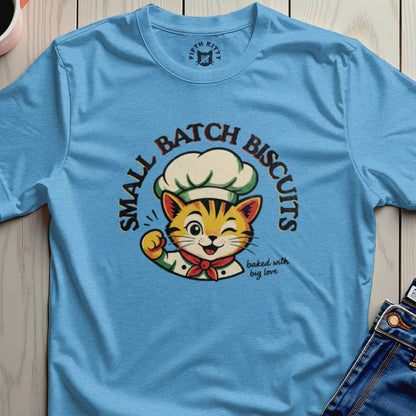 Light blue t-shirt with chef cat graphic saying "Small Batch Biscuits baked with big love".