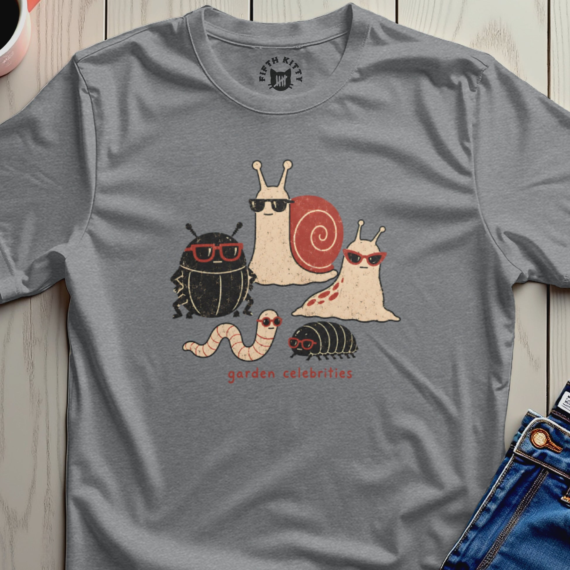 T-shirt graphic with cartoon insects wearing sunglasses, titled "garden celebrities."