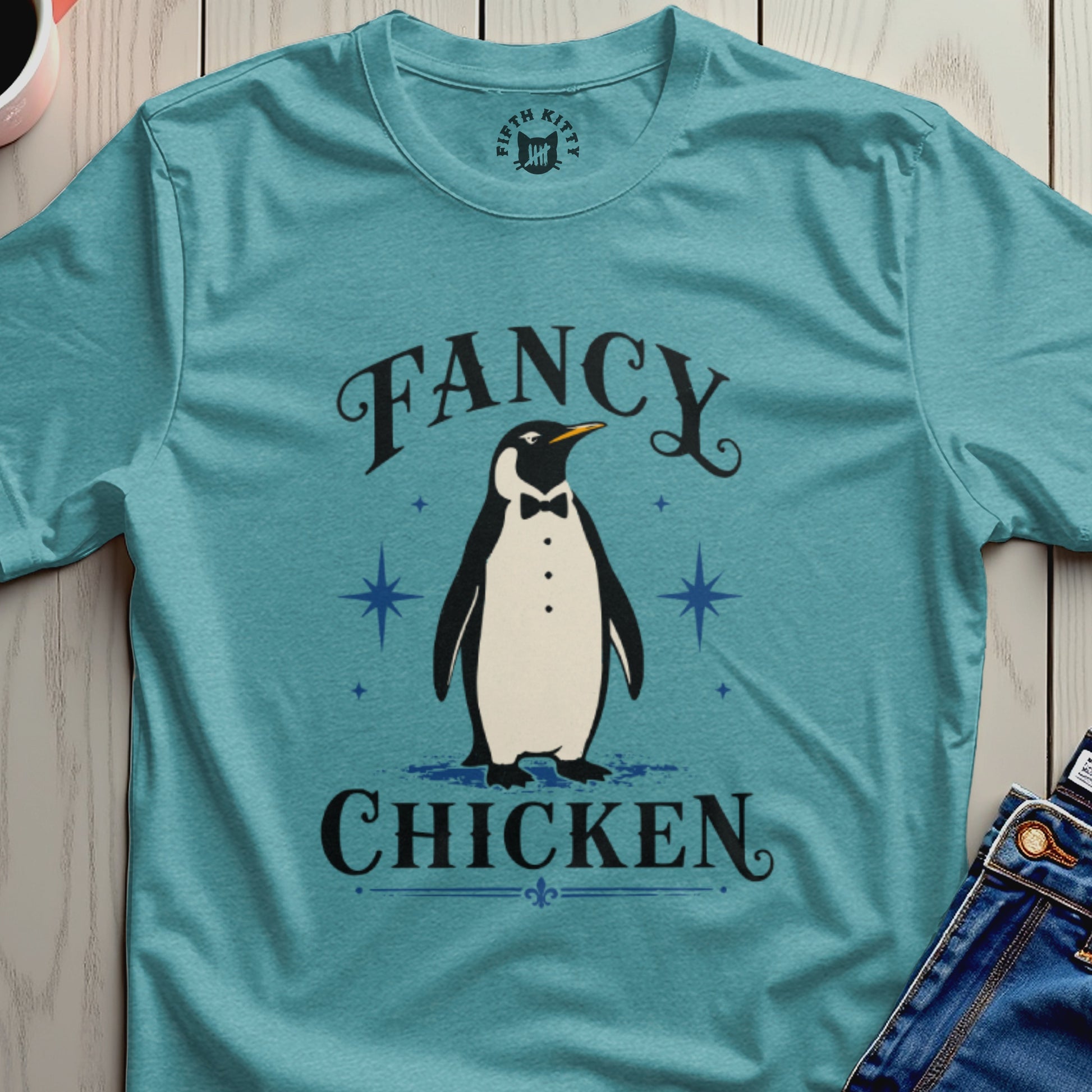 Teal t-shirt with a tuxedo-wearing penguin and text "FANCY CHICKEN"