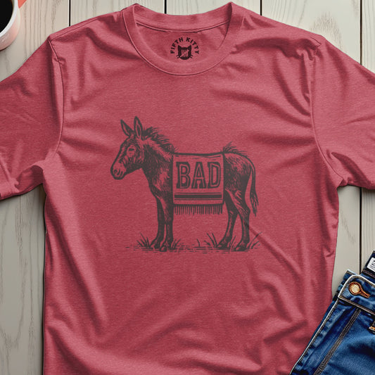 T-shirt with a graphic of a donkey wearing a blanket with the word "BAD" on it.