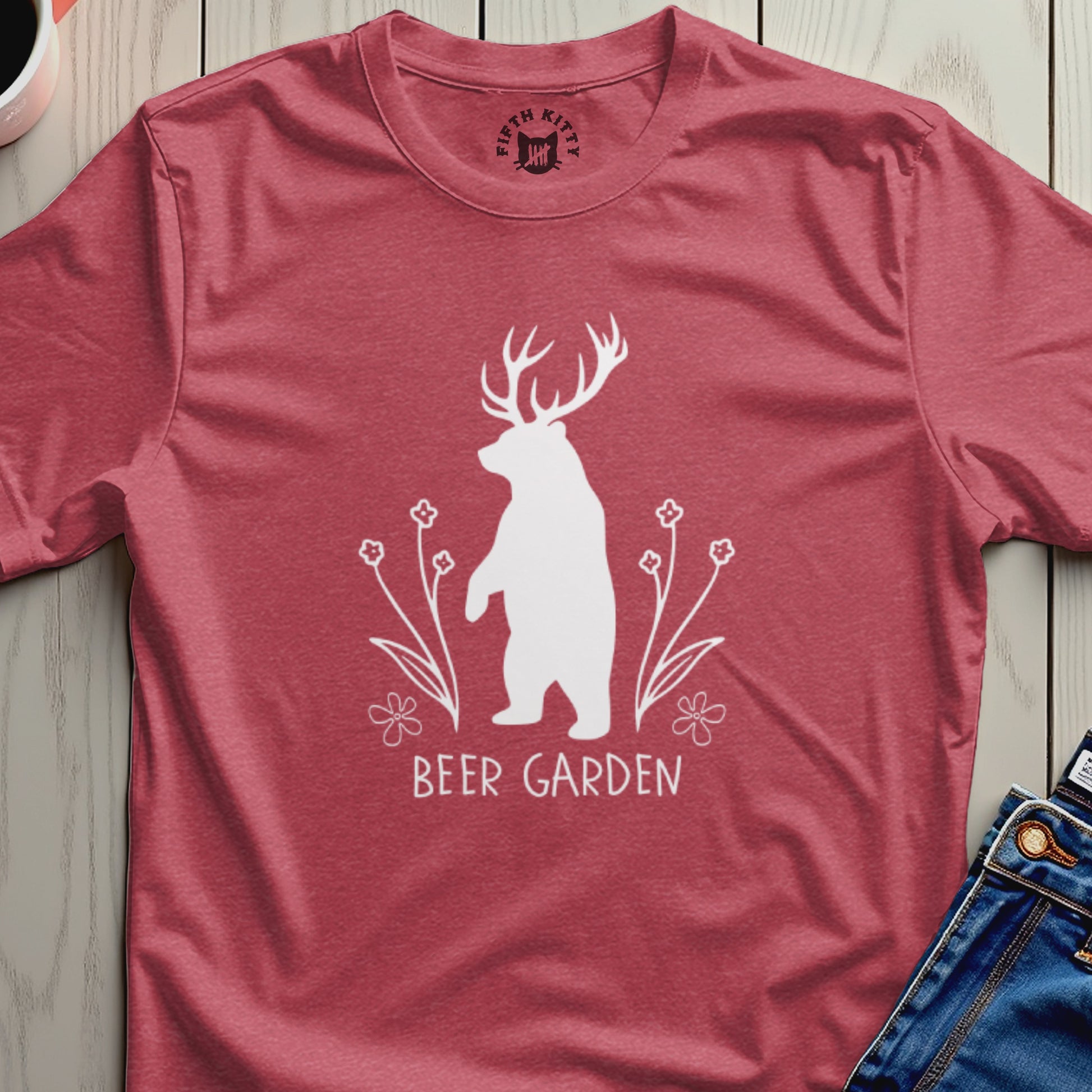 White bear with antlers and flowers, text "BEER GARDEN" on a heather red t-shirt.