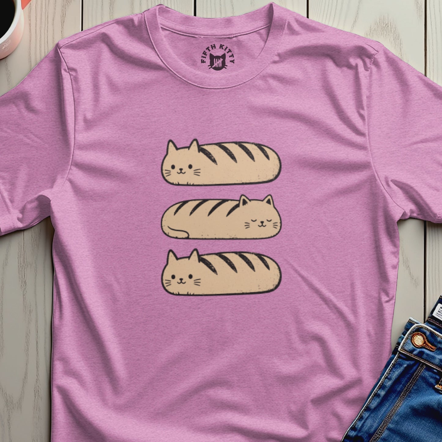 Pink t-shirt with a stack of three loaf-shaped cats graphic and "Fifth Kitty" logo.